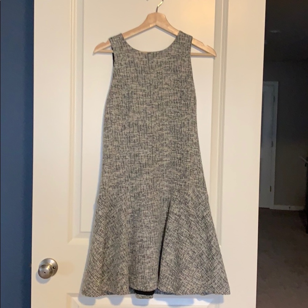 Sleeveless tweed dress with exposed zipper